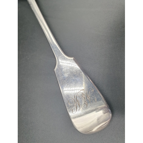 35 - A Victorian silver Basting Spoon fiddle pattern engraved initials, London 1863, maker: G Adams