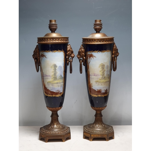 368 - A pair of Sevres style Table Lamps with panels painted lovers in landscapes, the reverse painted lan... 