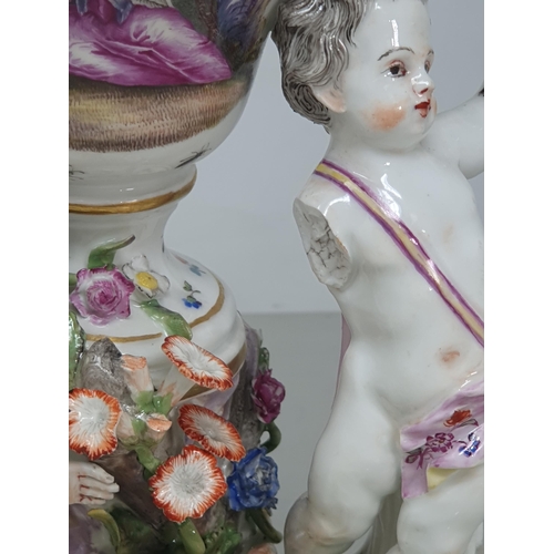 388 - A 19th Century Meissen lidded Urn painted with scene of couple with peeping Tom with trailing floral... 