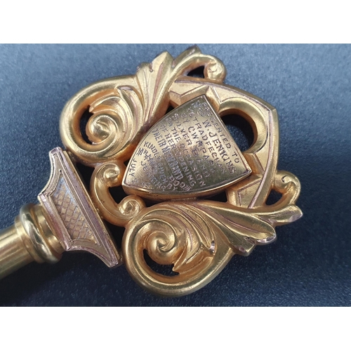 39 - An Edward VII 9ct Gold Key with scroll design, presentation inscription relating to Cwm Park Silver ... 