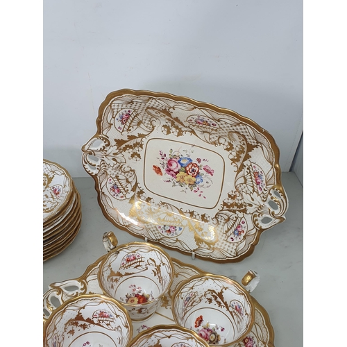 394 - A 19th Century Chamberlain Worcester part Tea Service with painted designs of floral bouquets amongs... 