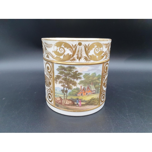 395 - A Crown Derby Mug with Imari colours, floral and leafage scroll designs on a blue ground, 5in H and ... 