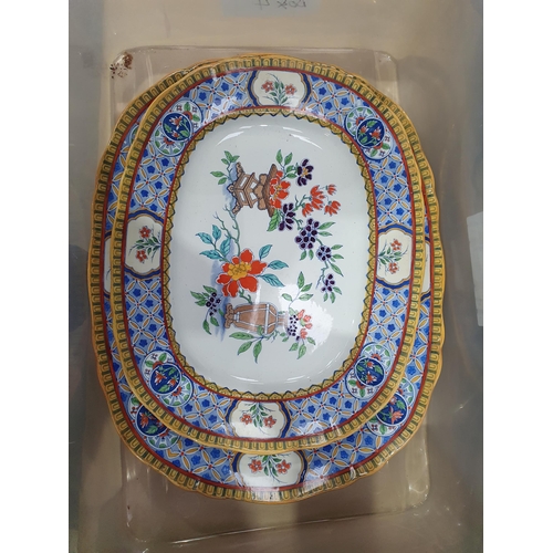 400 - A 19th Century Mintons part Dinner Service with blue and yellow friezes surrounding trailing floral ... 