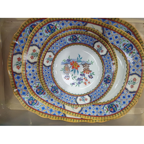 400 - A 19th Century Mintons part Dinner Service with blue and yellow friezes surrounding trailing floral ... 