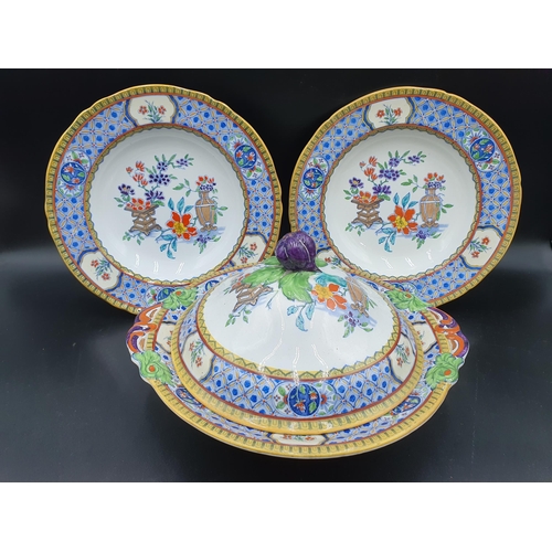 400 - A 19th Century Mintons part Dinner Service with blue and yellow friezes surrounding trailing floral ... 