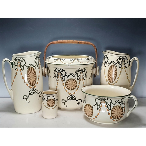 403 - A Royal Doulton Toilet Set, with medallions and ribbon designs, including a Pail and Cover with cane... 