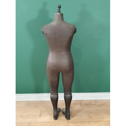 408 - An antique Dressmaker's Mannequin with hard fabric covered body and wooden lower legs and boots, sta... 