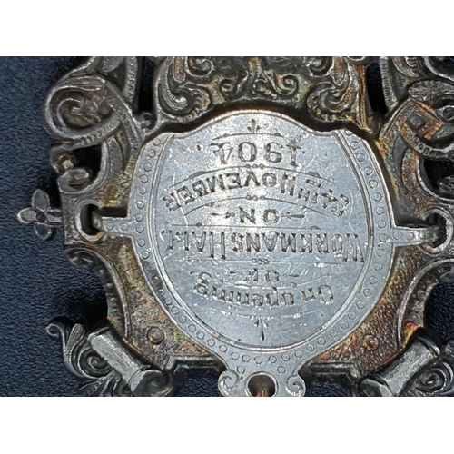 41 - An Edward VII silver Key with presentation inscription Ystrad Fechan, Birmingham 1904, and two other... 