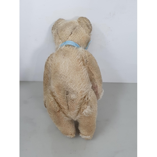 411 - An antique mohair Rabbit with glass eyes 8in H and a small antique Teddy Bear 5 1/2in H