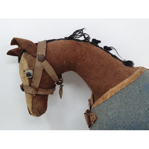 415 - An antique felt covered Model of a Horse with blue rug named 'Ambiguity' 9 1/2in L