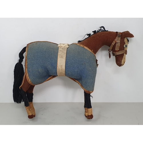 415 - An antique felt covered Model of a Horse with blue rug named 'Ambiguity' 9 1/2in L