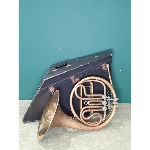 422 - A french brass Horn, marked Paxman Bros, Gerrard St. London, in case