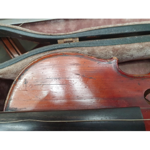 423 - A Nicolas Mathaeu full size Violin with two piece back and including two bows in case