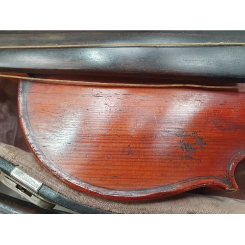 423 - A Nicolas Mathaeu full size Violin with two piece back and including two bows in case