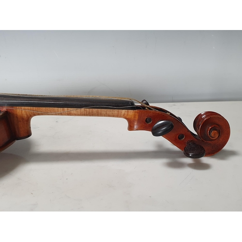 423 - A Nicolas Mathaeu full size Violin with two piece back and including two bows in case