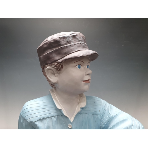 427 - A painted fibreglass Figure of a boy in clogs 2ft 7in H