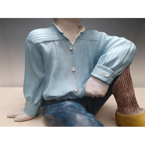 427 - A painted fibreglass Figure of a boy in clogs 2ft 7in H