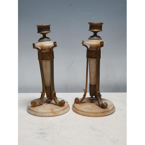 432 - A pair of alabaster and gilt metal Table Lamps with scrolled leafage supports and circular bases, 9 ... 