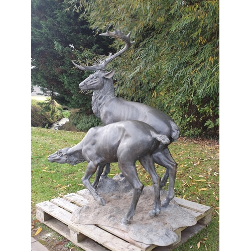 439 - An impressive alloy bronze effect Sculpture of a pair of Red Deer (one antler A/F) 4ft 10in H x 4ft ... 