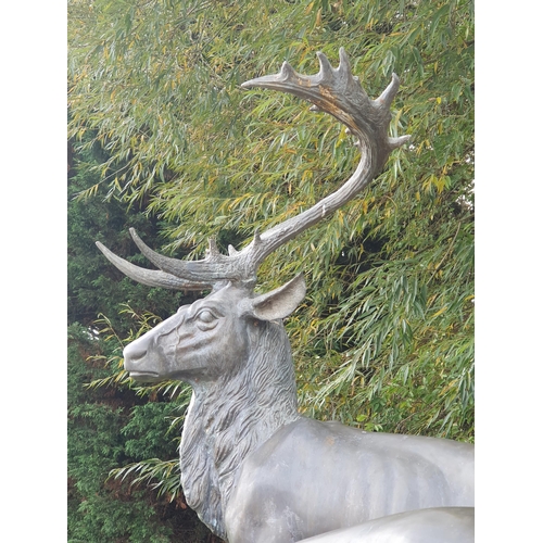 439 - An impressive alloy bronze effect Sculpture of a pair of Red Deer (one antler A/F) 4ft 10in H x 4ft ... 