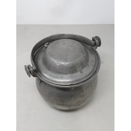 447 - A 19th Century French pewter lidded Cauldron with swing handle stamped 'Louis Barbau Anele' to base ... 