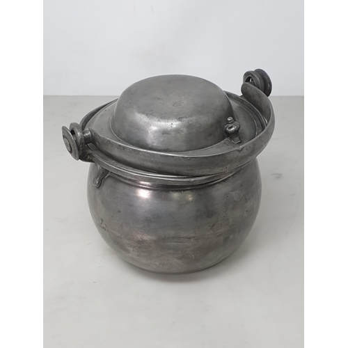 447 - A 19th Century French pewter lidded Cauldron with swing handle stamped 'Louis Barbau Anele' to base ... 