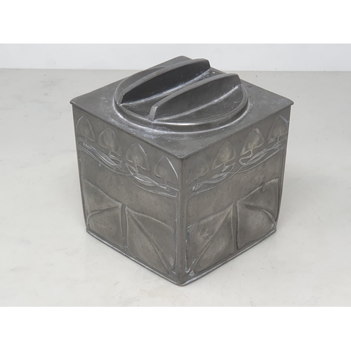 457 - An English pewter Biscuit Barrel and Cover in square form with Art Nouveau designs by Liberty and Co... 