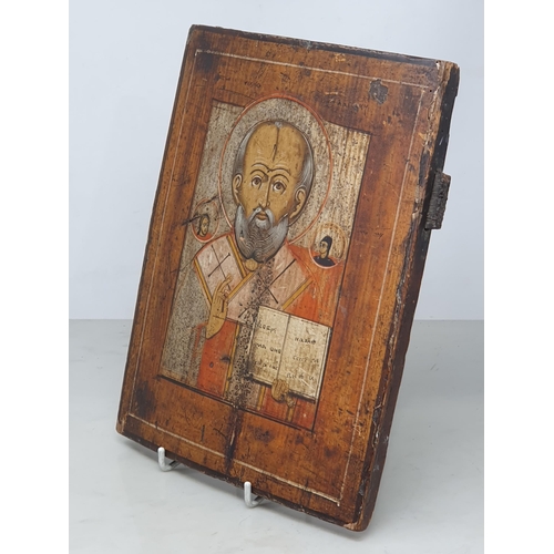 458 - A painted Russian Icon depicting 'Saint Nicholas' on wooden board, 10½in High x 8½in Wide