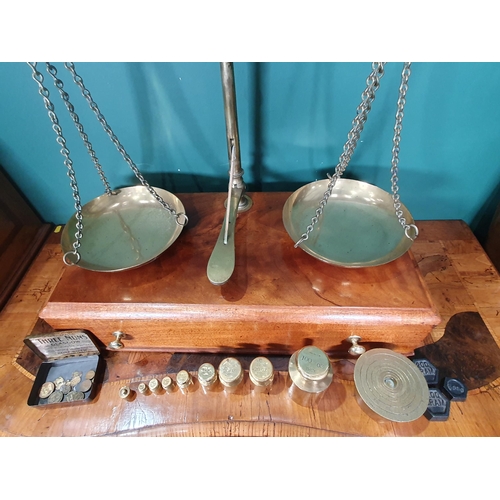 459 - A large set of Avery brass and mahogany gold Balance Scales, the base fitted drawer and with a quant... 