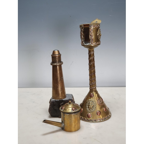 462 - A brass model of a Lighthouse mounted on a piece of stone, 6 1/4in H, and a Whale Oil Lamp