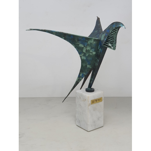 478 - WALENTY PYTEL. A painted steel Sculpture of an abstract Swallow, mounted on square white marble plin... 