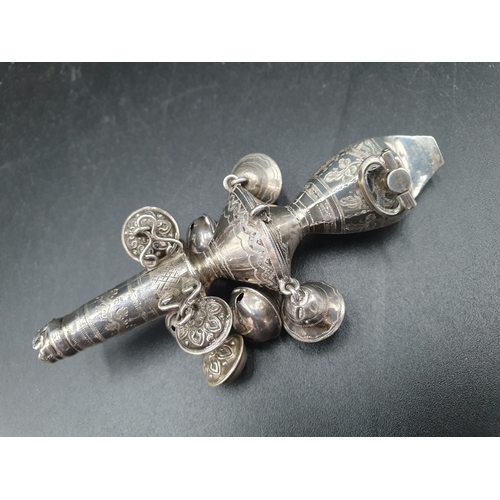 48 - A 19th Century silver Rattle with whistle and nine bells, leafage engraved friezes, one bell missing... 