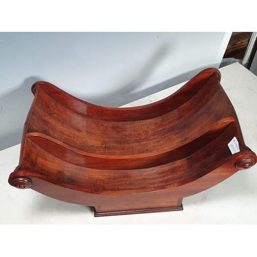 495 - An early 19th Century mahogany Cheese Coaster with roundels to the ends of the half-turned handles, ... 