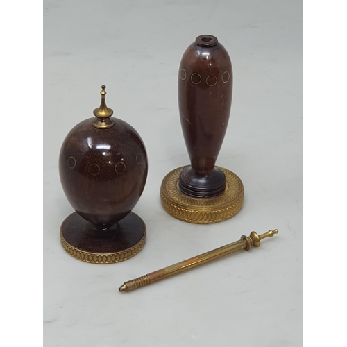 498 - A turned cocobola wood Scribe's Egg with ten inset circles engraved T. Faberge, 1984 to base 4in H, ... 