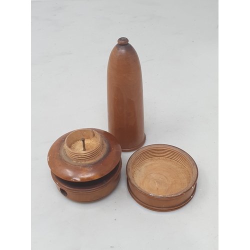 502 - A rare treen Travelling Candleholder in boxwood, the top unscrews and base section weighted with mat... 