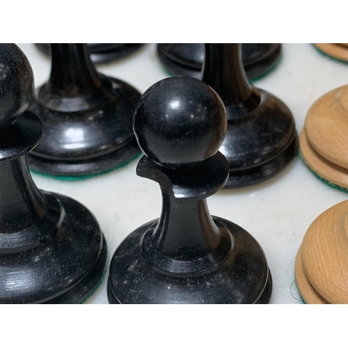 504 - AMENDMENT: A Staunton pattern, possibly by Ayres, boxwood and ebony Chess Set, four pieces marked wi... 