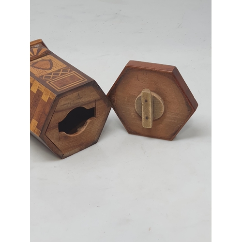 506 - A treen Money Box in the form of a hexagonal House with simulated windows and door, with twist off b... 