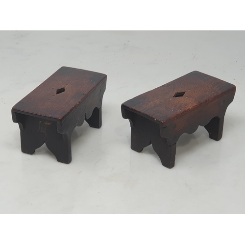 508 - A pair of miniature treen rectangular Stools with cut out diamond decoration and punch and cupid bow... 