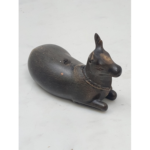 509 - A carved horn Pen Holder in the form of a recumbent goat with detachable head, A/F, 4in x 2in