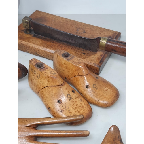 516 - A collection of treen items including a Glove Stretcher, pair of Shoe Lasts, a pair of child's Shoe ... 