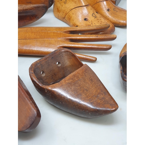 516 - A collection of treen items including a Glove Stretcher, pair of Shoe Lasts, a pair of child's Shoe ... 