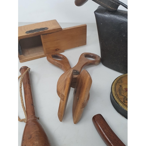 517 - A collection of treen items including a 19th Century turned lead weighted Fishing Priest, a goose wi... 