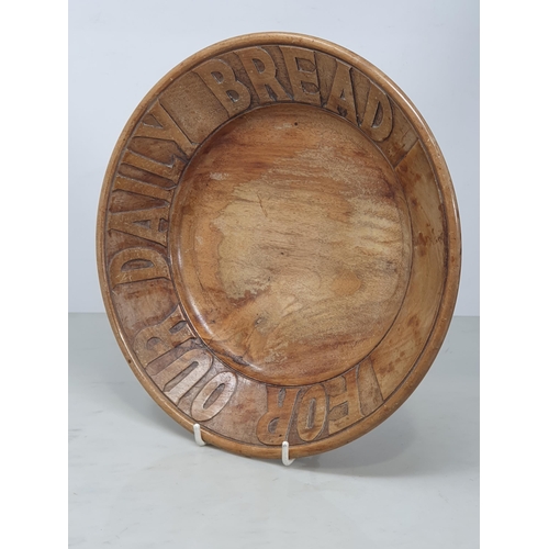 518 - A small collection of Treen Bowls including one with carved inscription 'For Our Daily Bread', anoth... 