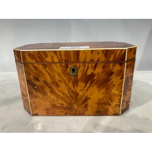 524 - A 19th Century tortoiseshell octagonal Tea Caddy, the hinged lid enclosing two-division interior, 4½... 