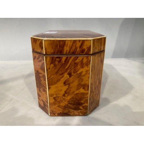 524 - A 19th Century tortoiseshell octagonal Tea Caddy, the hinged lid enclosing two-division interior, 4½... 