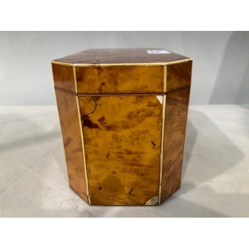 524 - A 19th Century tortoiseshell octagonal Tea Caddy, the hinged lid enclosing two-division interior, 4½... 