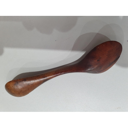 529 - A collection of treen Spoons including two Toddy Ladles, two Ladles, a carved and dated Love Spoon, ... 