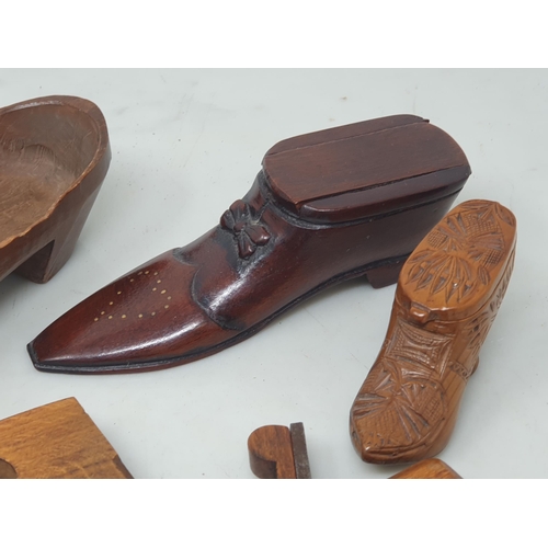 532 - A 19th Century novelty treen Snuff Box in the form of a Shoe with carved bow and inlaid brass decora... 