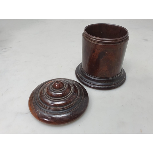 536 - A collection of treen including a ribbed Barrel enclosing Inkwell, four assorted turned treen contai... 