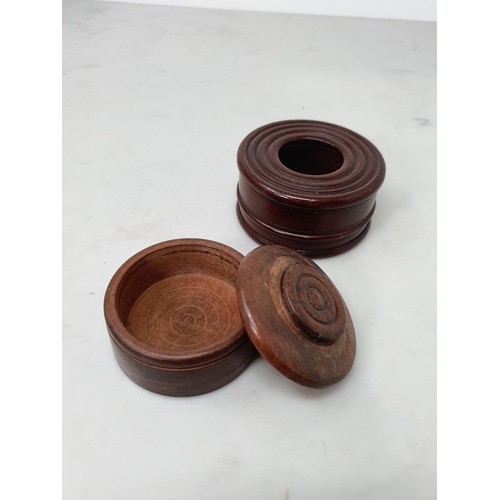 536 - A collection of treen including a ribbed Barrel enclosing Inkwell, four assorted turned treen contai... 